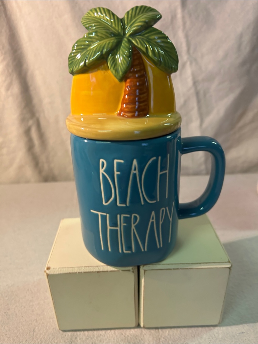 Rae Dunn Blue Ceramic Mug with Yellow Palm-Top Lid